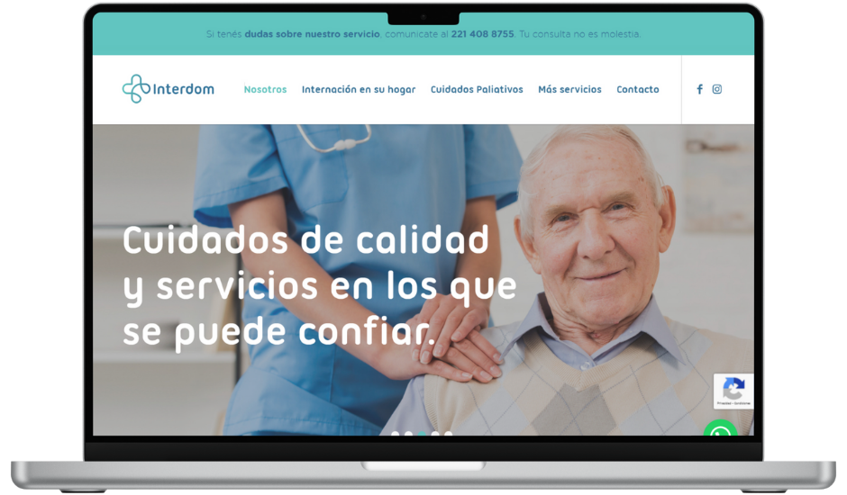 Imagen de una notebook visualizando el sitio de Interdom